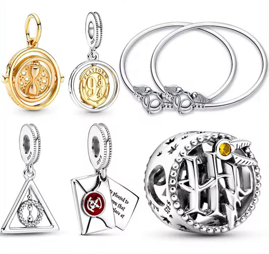 Pulsera de plata y charms