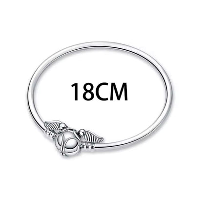 Pulsera de plata y charms